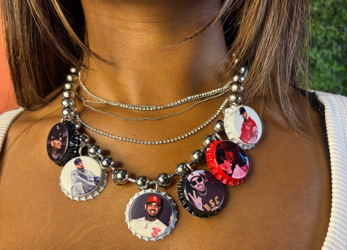 Handmade silver beaded necklace featuring multiple Chris Brown-inspired bottle cap charms, perfect for concerts, festivals, and music fan accessories.